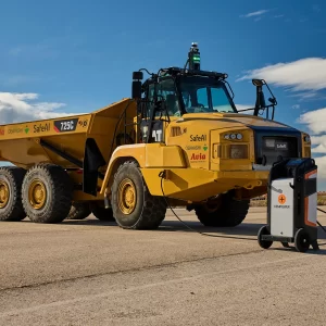 SafeAI and Obayashi unveil the world's first retrofit zero-emission Caterpillar 725 haul truck, a breakthrough in sustainable heavy industry.